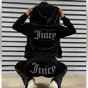 Juicy couture track suit (pants and zip up)
